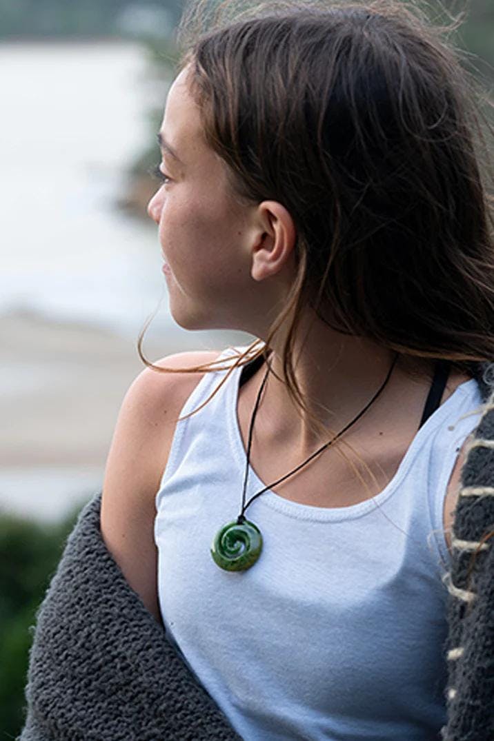 girl wearing a jade necklace